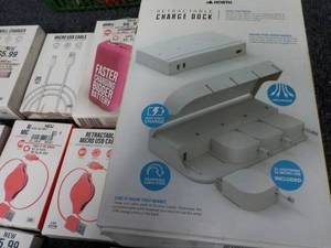 lot 24 image: USB cables, wall chargers, and retr...