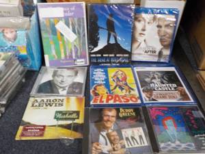lot 36 image: Blue-ray movies and CDs unopened...