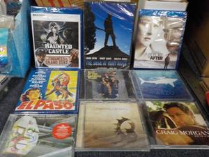 lot 37 image: Blue-ray movies and CDs unopened...