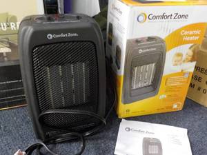 lot 110 image: Comfort Zone ceramic heater...