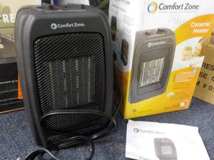 lot 111 image: Comfort Zone ceramic heater...
