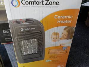 lot 113 image: Comfort Zone ceramic heater...