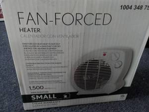 lot 135 image: Fan-forced heater 1500 watts...
