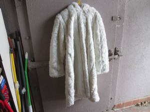 lot 4 image: Ladies Roamans Long White Fur Coat...