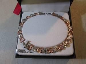 lot 12 image: 14KT Gold Plated Bracelet with Genu...