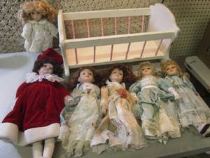 lot 29 image: Lot of Creamic Dolls and Wood Rocki...