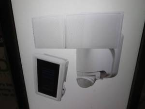 lot 43 image: 180-Degree White Solar Powered Moti...