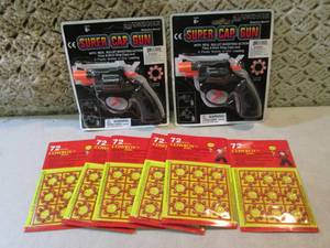 lot 121 image: 2 Super Cap Guns and 6 Packs of 8-S...