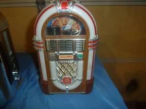 Whurlitzer Juke Box & Camel Juke Box