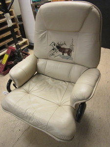 lot 708 image: LEATHER SWIVEL ARMCHAIR