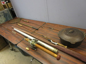 lot 749 image: VINTAGE FISHING POLES, NET, CAST IRON POT