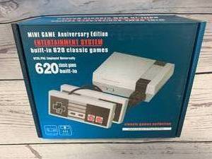 lot 1 image: Mini Entertainment Game System with 620 Games (new in box)