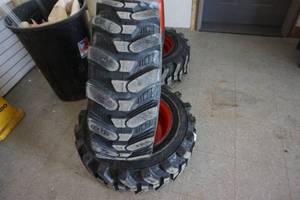lot 24 image: Set of 4 - Brand New Camso Impact Guard Rim Guard Skid Steer Tires and Rims