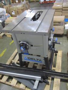 lot 64 image: Delta 15 Amp 10 in. Left Tilt 30 in. Contractor Table Saw, with Cast Iron Wings 36-5100