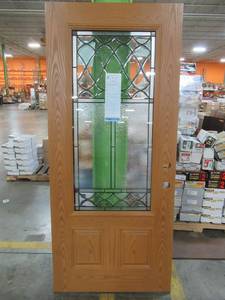 lot 204 image: Masonite 34 X 78 Fiberglass Solid Core Entry Door Slab With Oak Fetures, Double Bore 2 Panel, 34 Lite Decorative Low E Glass