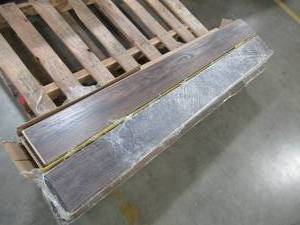 lot 221 image: 4 Cases of TrafficMaster Barnwood 8mm 50.79 X 4.96 X .47 Glueless Laminate Flooring (14 sq. ft.  case)