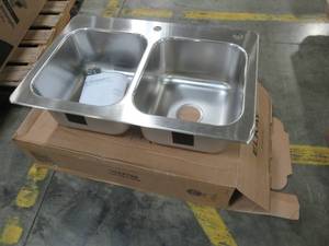 lot 249 image: Elkay 33 X 22 X 9 Stainless Steel Double-Basin Drop-in 2-Hole Kitchen Sink - Corner Slightly Bent.