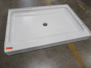 lot 279 image: Sterling Ensemble White Vikrell Shower Base 34 x 48 with Center Drain - Cracks on Front Corners by Tile Flange