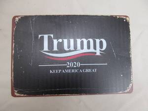 lot 63 image: metal sign