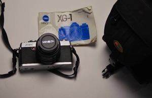 vintage Minolta XG-1 camera body with lense