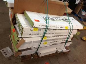 lot 15 image: Pallet of assorted Cap A Tread stair renewal sysrtem , storage totes and more