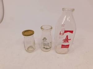 lot 54 image: Lot of 3 Glass Milk Bottles
