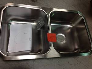 lot 39 image: MOEN 1800 Undermount Stainless Steel 31.75 in. Double Bowl Kitchen Sink in good Condition