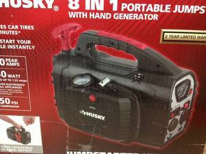 lot 69 image: Husky 8-in-1 12-Volt Power SourceJumpstarter in good Condition
