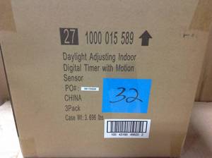 lot 32 image: Case of Defiant SunSmart 8 Amp In-Wall Digital Timer-new