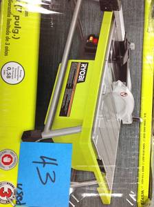 lot 43 image: RYOBI 7 in. 4.8 Amp Tabletop Tile Saw USED in good condition