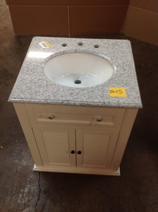 lot D105 image: Home Decorators Collection Hamilton Shutter 25 in. W x 22 in. D Bath Vanity in Ivory with Granite Vanity Top in Grey whit small scratch on the side other wise in good conditions