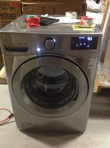 lot 101 image: LG Electronics 4.5 cu.ft. High Efficiency Large Smart Front Load Washer whit small dents