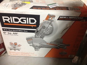lot 110 image: RIDGID 15 Amp 10 in. Dual Miter Saw in good conditions