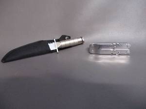 lot 11 image: Leatherman Utility tool and Knife