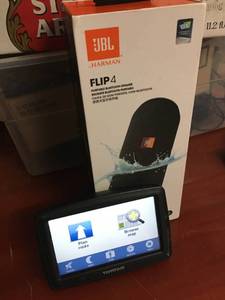 lot 40 image: TomTom GPS and JBL Bluetooth Speaker