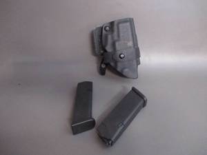 lot 74 image: Handgun Holster and Clips