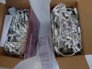 lot 55 image: Holiday Living 300-Count Constant White Mini Incandescent Plug-In Christmas Icicle Lights