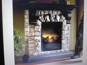 lot 28 image: Faux Stone Fireplace open box Retai...