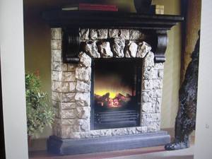 lot 33 image: Faux Stone Fireplace open box Retai...