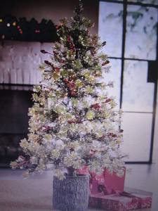 lot 102 image: 4-Ft. Prelit Tree with Trunk Pot op...
