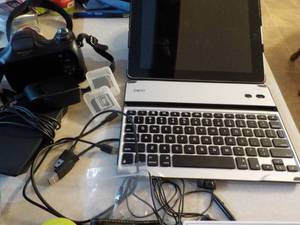 Zagg, sony camera, I phone 5, elect...