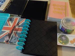 Office supplies in a sterilite stor...