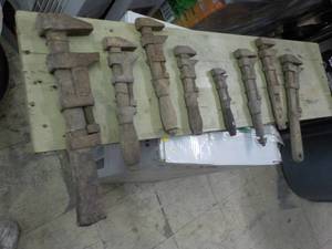 Vintage Tools displayed on wood boa...