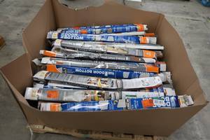 lot 5 image: HALF GAYLORD OF DOOR TRIM AND DRAFT STOPPERS