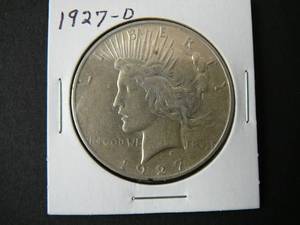 lot 4 image: 1927d Peace Silver Dollar