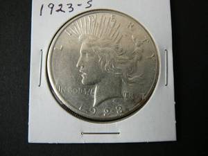 lot 8 image: 1923s Peace Silver Dollar