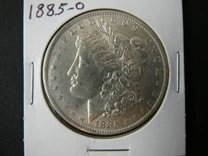 lot 15 image: 1885o Morgan Silver Dollar