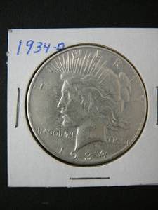 lot 58 image: 1934d Morgan Silver Dollar