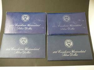 lot 94 image: 4- Eisenhower Dollars 2- 1971, 1- 1972, 1- 1973