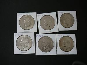 lot 128 image: 6- Eisenhower Dollars 1974, 1974d, 1973d, 1972d, 1973, 1776-1976